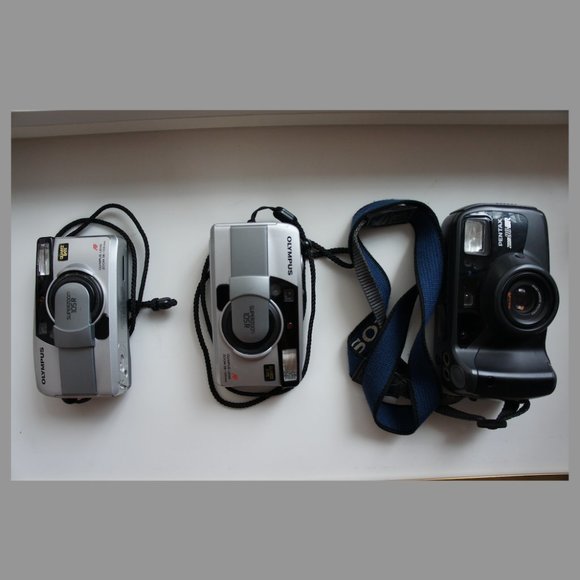 Pentax zoom 90-wr and two Olympus Superzoom 105R